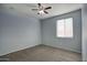 Bedroom with ceiling fan and window blinds at 19539 N 260Th Ln, Buckeye, AZ 85396