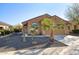 Single-story house with desert landscaping and two-car garage at 19539 N 260Th Ln, Buckeye, AZ 85396