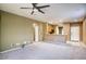 Open living area with kitchen views and access to other rooms at 19539 N 260Th Ln, Buckeye, AZ 85396