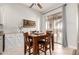 Dining area with backyard access, natural lighting and wine storage at 20971 S Hadrian Way, Queen Creek, AZ 85142