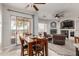 Open dining area with natural light, flows into living room, with backyard access at 20971 S Hadrian Way, Queen Creek, AZ 85142