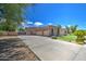 Home with a three-car garage and long driveway at 20971 S Hadrian Way, Queen Creek, AZ 85142