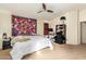 Bedroom with carpet floors, ceiling fan, and desk area at 2150 E Bell Rd # 1090, Phoenix, AZ 85022