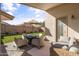 Relaxing patio with fire pit and seating at 2329 W Oberlin Way, Phoenix, AZ 85085