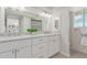 Double vanity bathroom with granite countertop at 2415 E Cochise Rd, Phoenix, AZ 85028