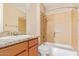 A bathroom featuring a granite countertop and a tiled shower/tub combo at 263 W Rosemary Dr, Chandler, AZ 85248