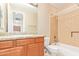 A clean bathroom featuring a vanity with granite countertop and a tiled shower/tub combo at 263 W Rosemary Dr, Chandler, AZ 85248