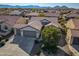 Single-story home with two-car garage and mountain views at 26335 W Burnett Rd, Buckeye, AZ 85396