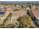 Aerial view of a home's backyard, highlighting a covered patio and well-maintained landscaping at 26335 W Burnett Rd, Buckeye, AZ 85396