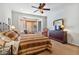 Spacious bedroom with a king-size bed and large window at 26335 W Burnett Rd, Buckeye, AZ 85396