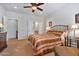 Guest bedroom with double bed and en-suite bathroom access at 26335 W Burnett Rd, Buckeye, AZ 85396