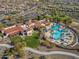 Community center with large pool, lounge areas, and Spanish-style architecture at 26335 W Burnett Rd, Buckeye, AZ 85396
