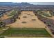 Aerial view of driving range with many people at 26335 W Burnett Rd, Buckeye, AZ 85396