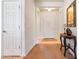 Bright and airy entryway with neutral colored flooring and walls at 26335 W Burnett Rd, Buckeye, AZ 85396