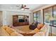 Relaxing living room with built-in entertainment center and comfortable seating at 26335 W Burnett Rd, Buckeye, AZ 85396