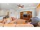 Comfortable living room with large sectional sofa and built-in entertainment center at 26335 W Burnett Rd, Buckeye, AZ 85396