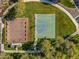 Aerial view of community basketball and sand volleyball courts at 26335 W Burnett Rd, Buckeye, AZ 85396