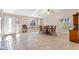 Bright dining area with a round table, built-in window seat and hardwood flooring at 2706 E Azalea Ct, Gilbert, AZ 85298