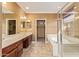 Double vanity bathroom with a large shower and garden tub at 2927 W Plum Hollow Dr, Anthem, AZ 85086