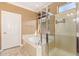 Bathroom with a large garden tub and walk-in shower at 2927 W Plum Hollow Dr, Anthem, AZ 85086