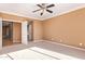 Spacious bedroom with access to hallway and ample sunlight at 2927 W Plum Hollow Dr, Anthem, AZ 85086