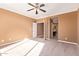 Bedroom with access to bathroom and neutral wall tones at 2927 W Plum Hollow Dr, Anthem, AZ 85086