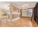Bright dining room with hardwood floors and a decorative fireplace at 2927 W Plum Hollow Dr, Anthem, AZ 85086