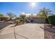 Single-story home with driveway and desert landscaping at 2927 W Plum Hollow Dr, Anthem, AZ 85086