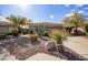 Single-story home with desert landscaping and two-car garage at 2927 W Plum Hollow Dr, Anthem, AZ 85086