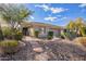 Single-story home with desert landscaping and two-car garage at 2927 W Plum Hollow Dr, Anthem, AZ 85086