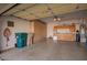 Garage with overhead storage, cabinets, and work area at 2927 W Plum Hollow Dr, Anthem, AZ 85086