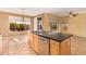 Kitchen island with a sink and dishwasher at 2927 W Plum Hollow Dr, Anthem, AZ 85086