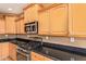 Well-equipped kitchen with gas stove and microwave at 2927 W Plum Hollow Dr, Anthem, AZ 85086