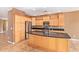 Modern kitchen with stainless steel appliances and island at 2927 W Plum Hollow Dr, Anthem, AZ 85086