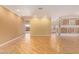 Open living room showcasing hardwood floors and tile at 2927 W Plum Hollow Dr, Anthem, AZ 85086