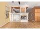 Living room with a fireplace and built-in shelving units at 2927 W Plum Hollow Dr, Anthem, AZ 85086