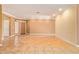 Spacious living room with hardwood and tile floors at 2927 W Plum Hollow Dr, Anthem, AZ 85086