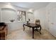 Office featuring neutral walls and floors, natural lighting, and built-in shelves at 300 N Portland Ave, Gilbert, AZ 85234