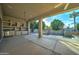 Inviting outdoor kitchen and covered patio with a view of the pool at 300 N Portland Ave, Gilbert, AZ 85234