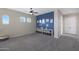 Spacious playroom with blue accent wall and built-in storage at 3007 S Colonial St, Gilbert, AZ 85295