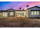 Back of house features an open patio and seamless indoor-outdoor transition for the ultimate outdoor experience at 3021 N 47Th St, Phoenix, AZ 85018