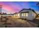 A dusk shot of the backyard with a newly landscaped yard at 3021 N 47Th St, Phoenix, AZ 85018