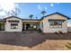 Exterior home view with desert landscaping and modern design at 3021 N 47Th St, Phoenix, AZ 85018