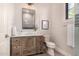 Stylish bathroom with a rustic vanity and modern fixtures at 3021 N 47Th St, Phoenix, AZ 85018