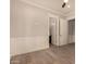 An empty bedroom with light hardwood floors and a neutral color scheme at 3021 N 47Th St, Phoenix, AZ 85018