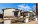 Charming single-Gathering home featuring a landscaped front yard, brick accents, and a modern garage door at 3021 N 47Th St, Phoenix, AZ 85018