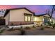 Inviting single-Gathering home featuring well-manicured landscaping, brick accents, and a modern garage door at 3021 N 47Th St, Phoenix, AZ 85018