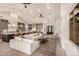 Open-concept living room with a gourmet kitchen, vaulted ceilings and lots of natural light at 3021 N 47Th St, Phoenix, AZ 85018