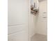 Compact utility room shows off its space-saving design with wall-mounted units and clean finishes at 3021 N 47Th St, Phoenix, AZ 85018