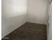 Small bedroom with gray carpet and minimal features at 3120 N 67Th Ln # 42, Phoenix, AZ 85033